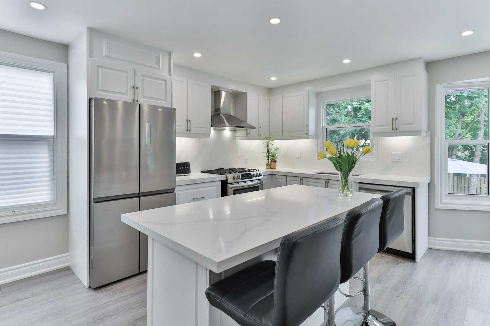 Bright kitchen with a natural-light window above the sink and a clean countertop.