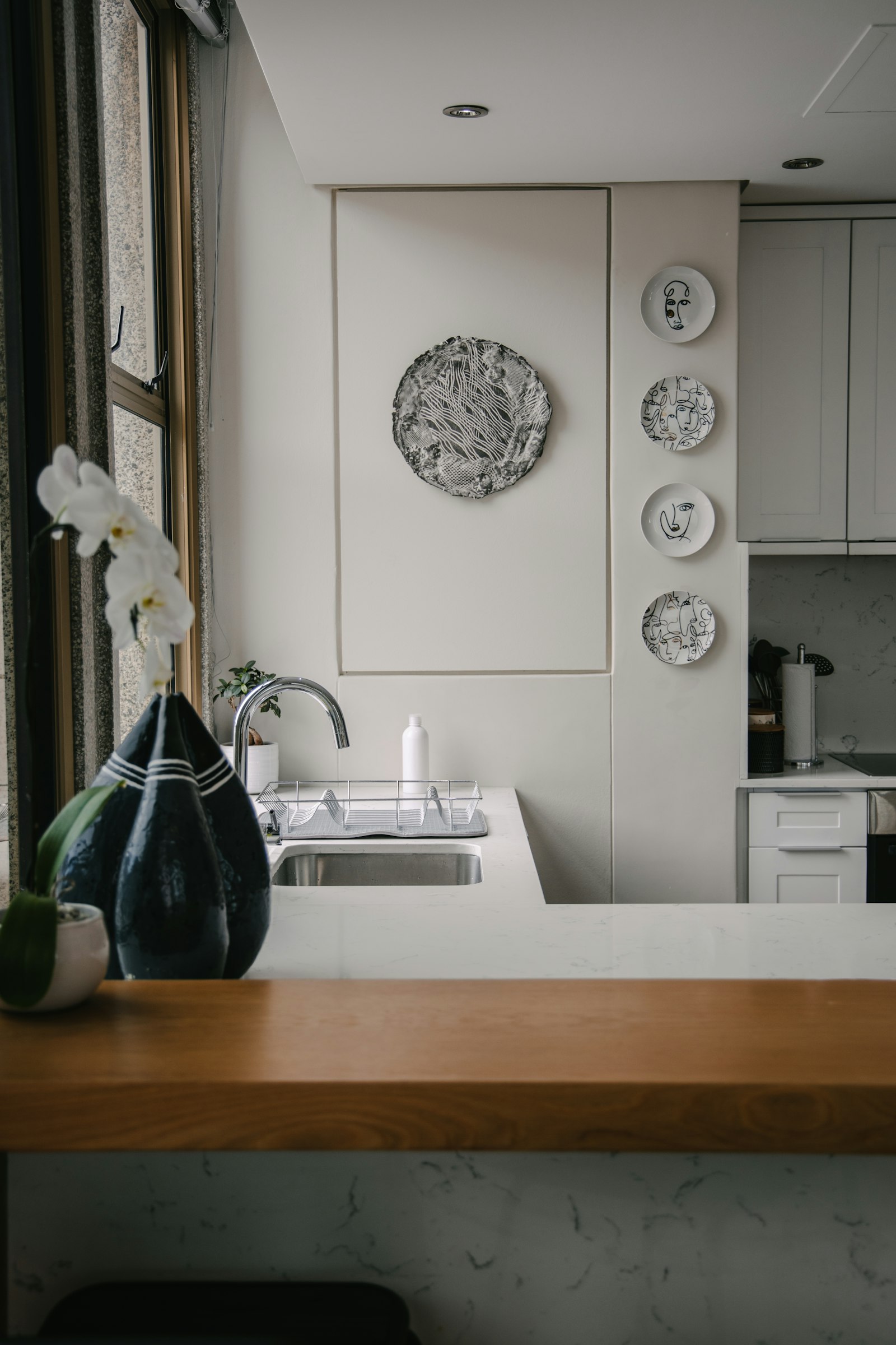 Clean kitchen sink and countertop area, ready for daily use.